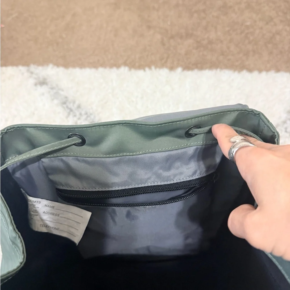 L.L. Bean olive green backpack with black trim